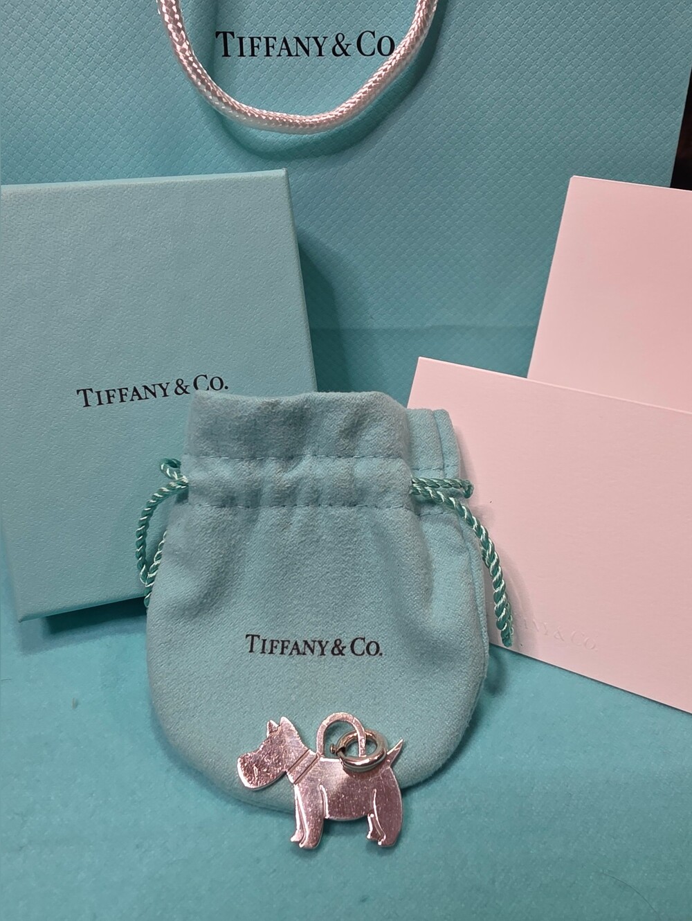 TIFFANY & CO SCOTTY DOG CHARM WITH TIFFANY SPRING RING. COMES WITH ALL SHOWN.
